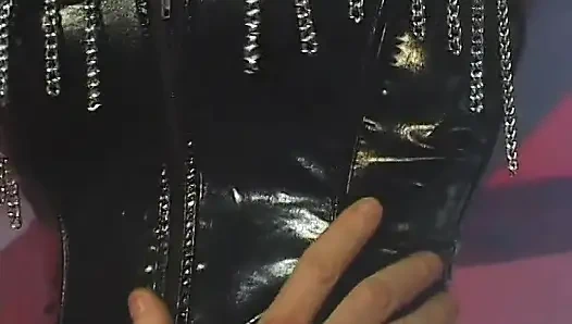 This slut loves sucking huge cock while bound in leather