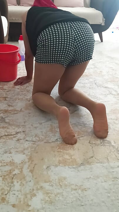 My big-buttocked, turbaned stepmother while cleaning