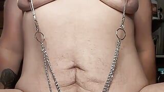 Sub femboy Slide Grant cock chained to nipple clamps tittie's jump and pull on clit cock