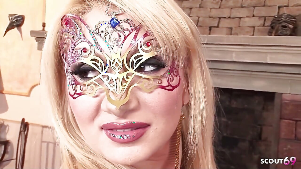 Blonde MILF Lea Lexis Gets Anal Fucked in a Villa During a Fetish Party with a Masked Guy in a Threesome