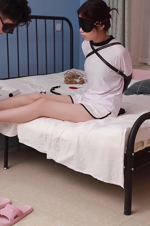 A Cute College Girlfriend Tries on the Restraints of a Leather Single Glove and Leather Ankle Shackles, Tickling Her Feet