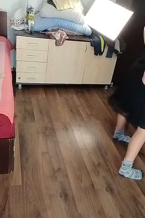 Amateur Woman Has Fun Trying on Clothes and Cutting Them.