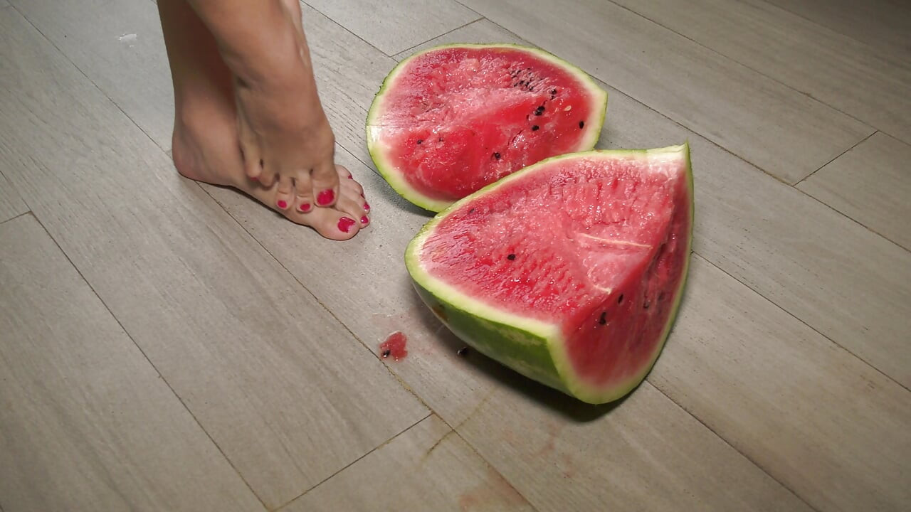 Busty MILF Presents Her Feet and Plays with a Watermelon