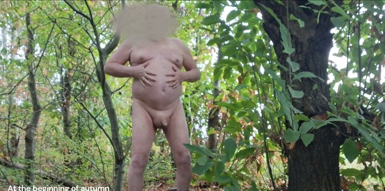 Being naked outside in the woods during the beginning of autumn, with falling leaves, feels good