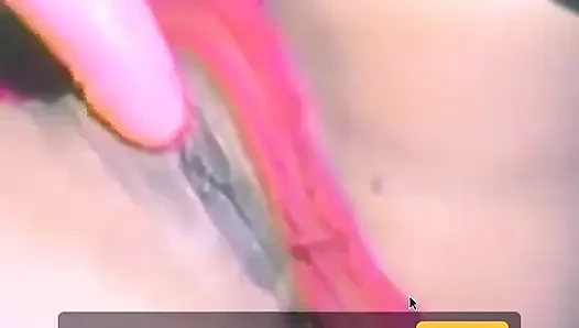 An Ebony Babe Fucks Herself with Lots of Dildos