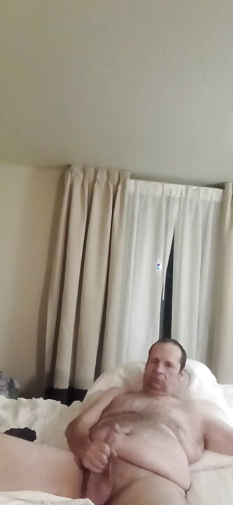 He strokes and talks dirty until she can't take it