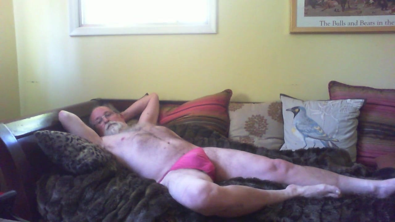 Playing in pink panties