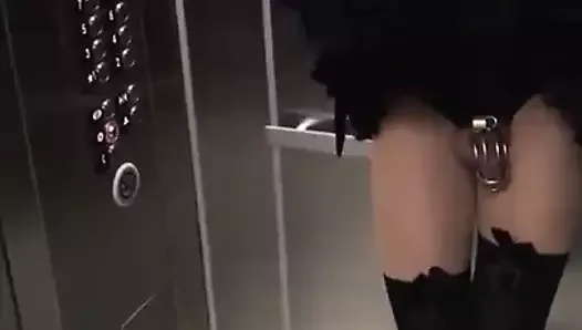 Crossdresser sissy showing her stuff in public elevator