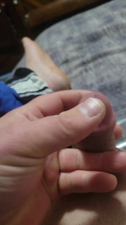 Horny 37 in bed rubbing a increasingly damp cock