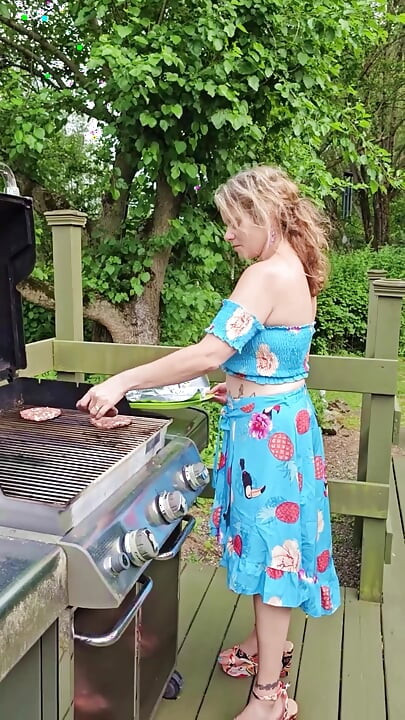 OnlyFans Voyeur look at MOMMY Enjoying the Summer Barbecuing Meat with her BIG TITS Out in the Sunshine