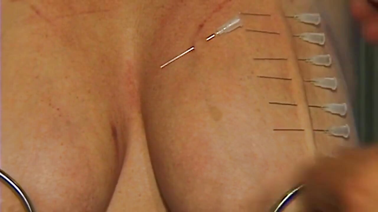 Redhead MILF Submits to Weighted Nipple Clamps