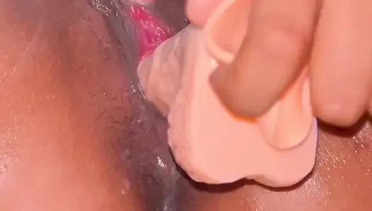 Woman with black pussy moans in pain from being stabbed with a big penis dildo - Part 1