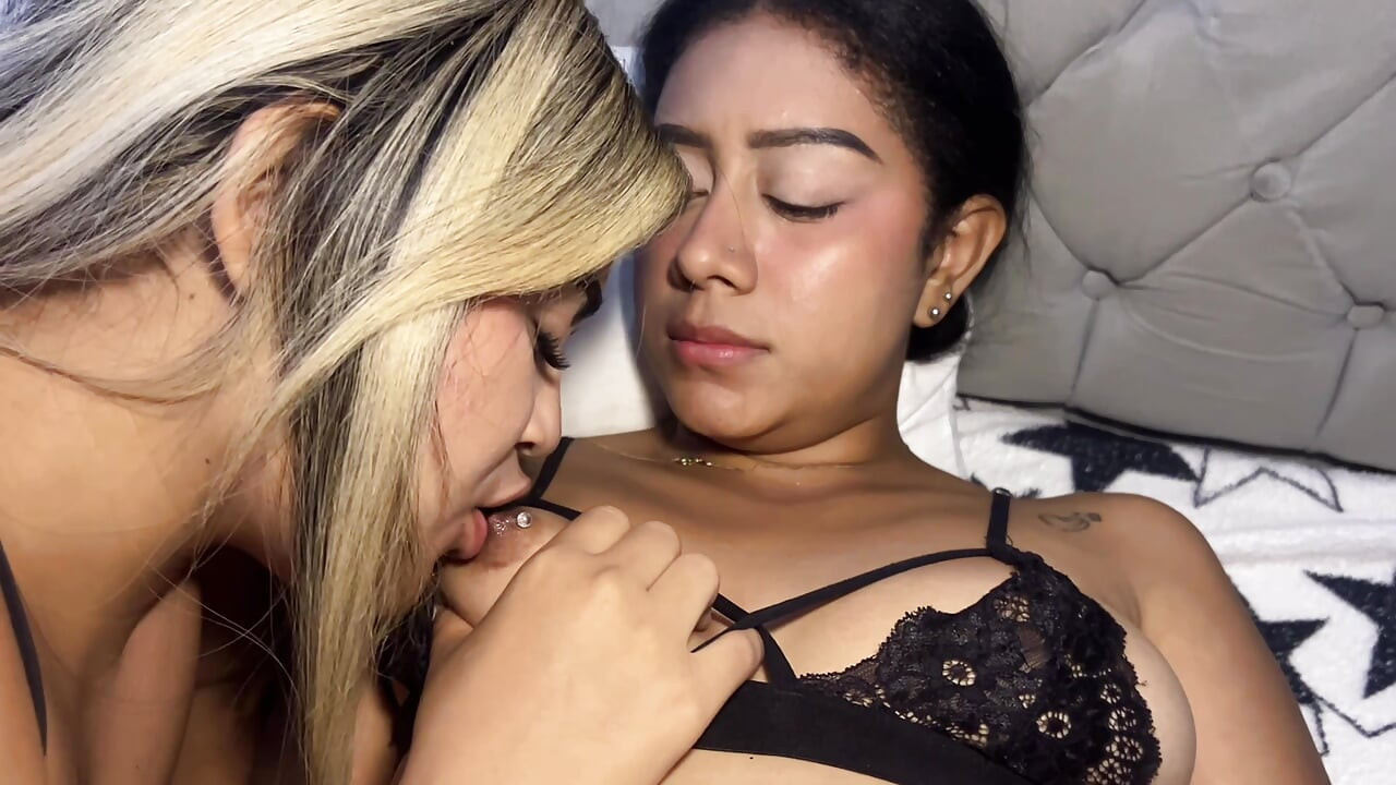 Blonde and blackhead play with their pussies in passionate lesbian sex
