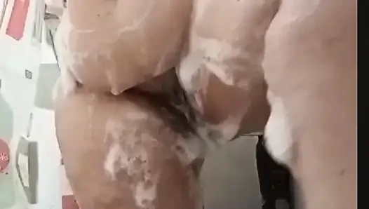 Girl masturbates in the shower
