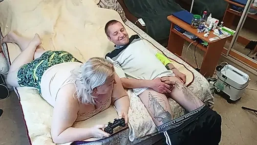 the game of the console ended with a blowjob from the stepmom with swallowing sperm