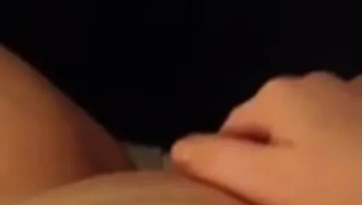 Woman fingering her wet pussy.