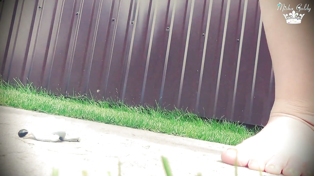 Misha Destroys a Tiny Man Toy by Her Ass, Between Huge Tits, in Mouth, Under Flip Flops and Feet
