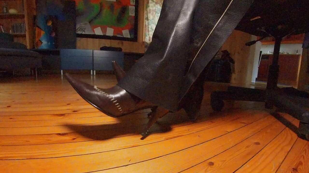 Leather chaps and pointy boots