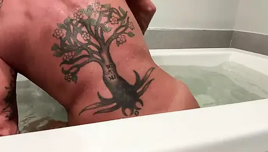 Muscle Goddess Fucks Her Big Clit with the Shower Nozzle