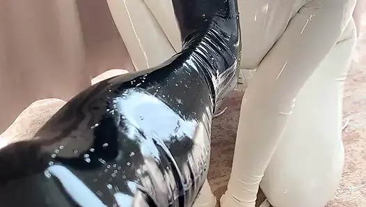 White rubber doll licks toes