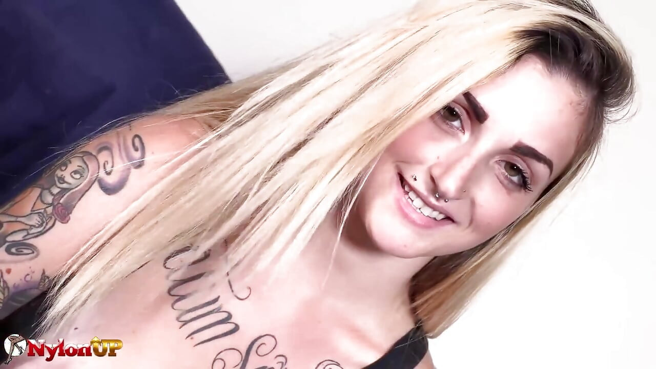 Alluring tattooed girl is riding her big sex toy