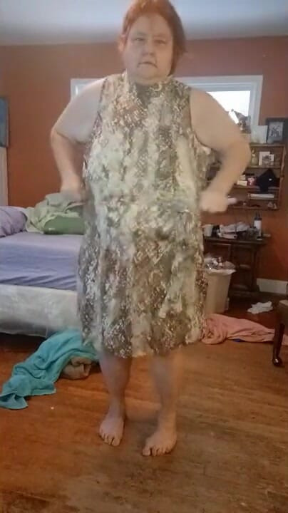Dressing  in fluffy print dress from nude