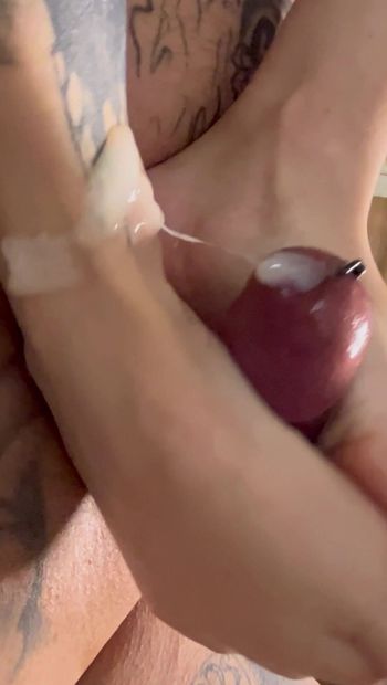 Footjob for pierced cock. Jerked off with his feet until he spreads his sperm dung on his feet.