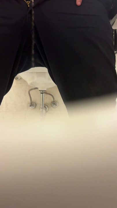 Pissing in public restroom