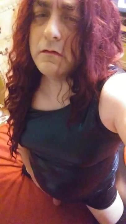 TS Cristy gets off in Latex Dress