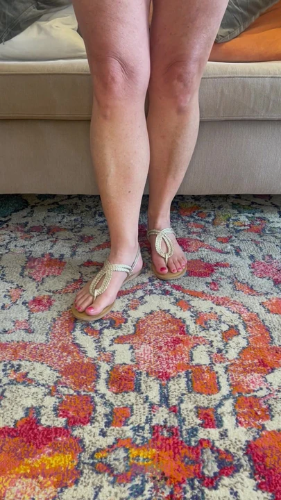 Muscular legs and sandals