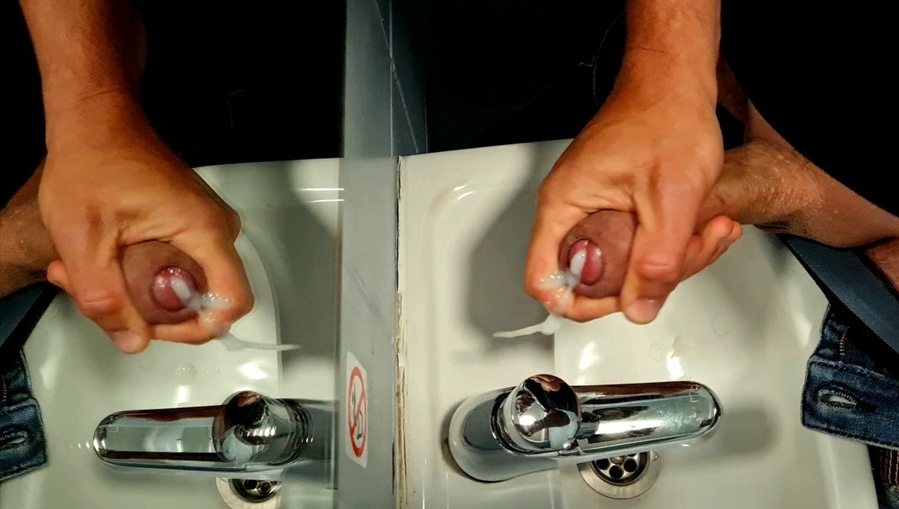Felixproducer is wanking in a public toilet and cums all over the sink and the mirror