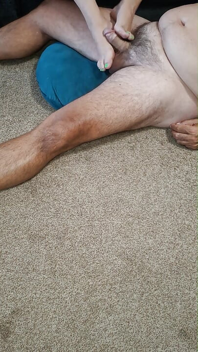 After teasing me with her feet I couldn't hold back and started licking and kissing them and jerking off