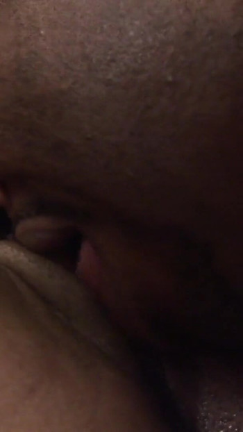 Captivating moment from "Black dude eats and plows hot black pussy in living room"