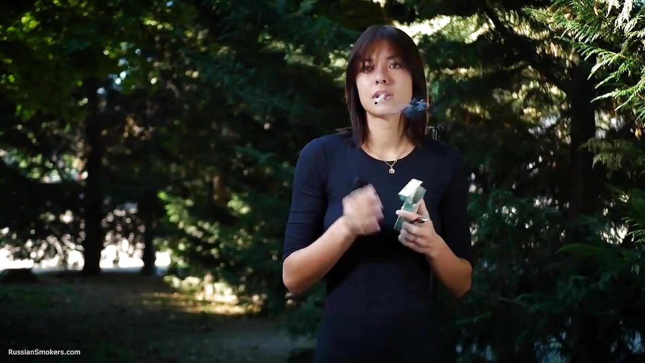 Sweet Russian Beauty Smoking Cigarette in Nature