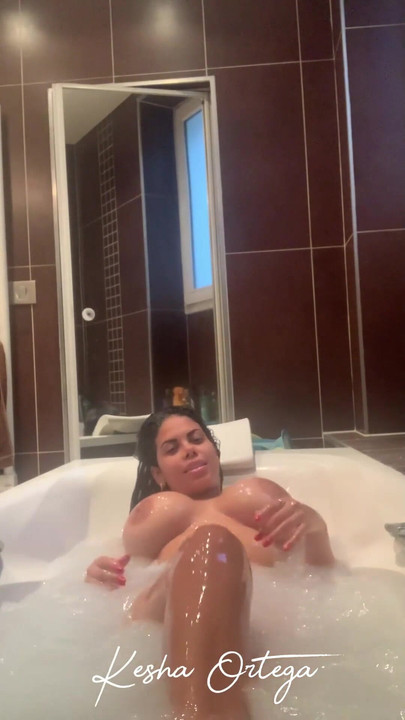 Captivating moment from "Hot AF Brunette Kesha Ortega Plays With Her Massive Tits!"