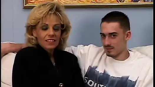 Hot blonde gets bent over and fucked doggystyle on the couch