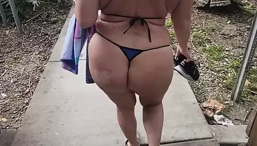 Milk walking in public wearing a thong