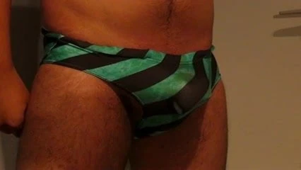 Cumm oozing through swimwear