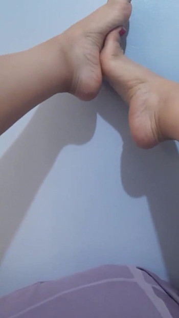 Key moment from "I show my feet, my hairy pussy, and my huge ass to my friend's son, and he jerks off his young cock."