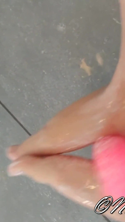 Dildo footjob in the shower with soap