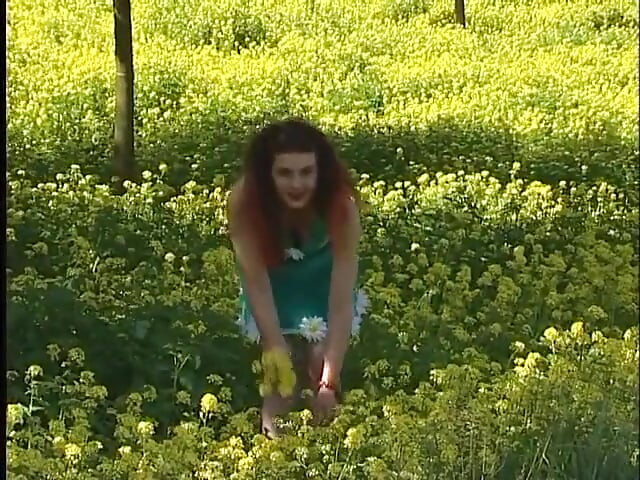 Busty redhead teen lifting dress outdoors