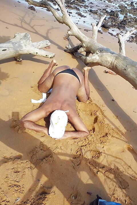 Ladysilva on the beach in panties with her hot ass
