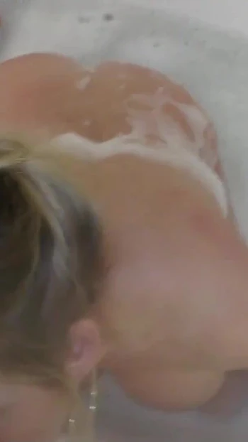 Stunning moment from "GERMAN MOM MANU SEDUCED TO POV BLOWJOB IN BATH BY STEPSON"