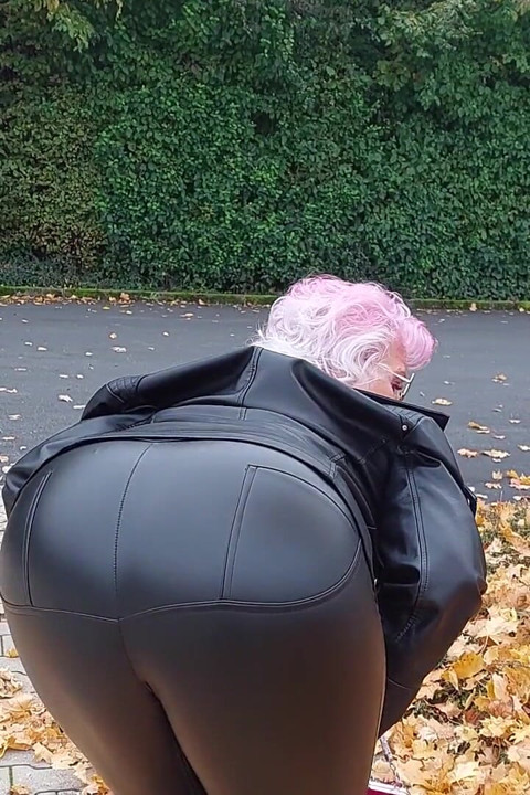 Naughty Granny Tongue Out Flashing Big Tits in Public