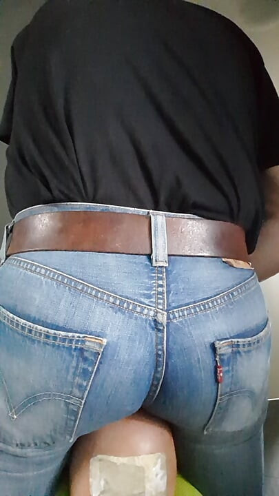 My jeans-butt riding the face of my sitting-doll