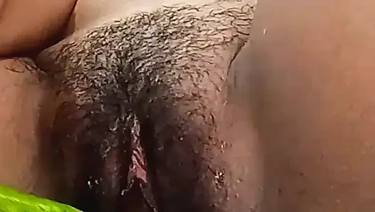 Teen college girl masterbating using cucumber