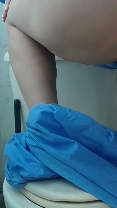 Perverted nurse enters the bathroom to play with her pussy after seeing her patient's huge cock | Clip 1