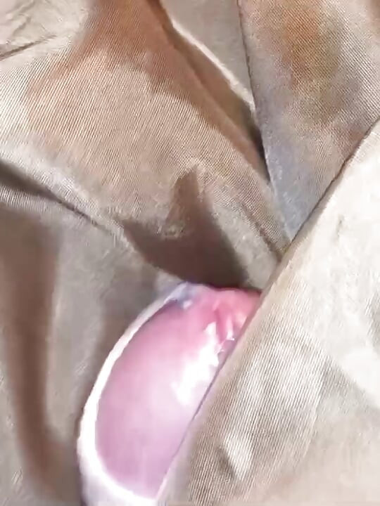 2 cumshots on the shiny lining of a lady puffercoat