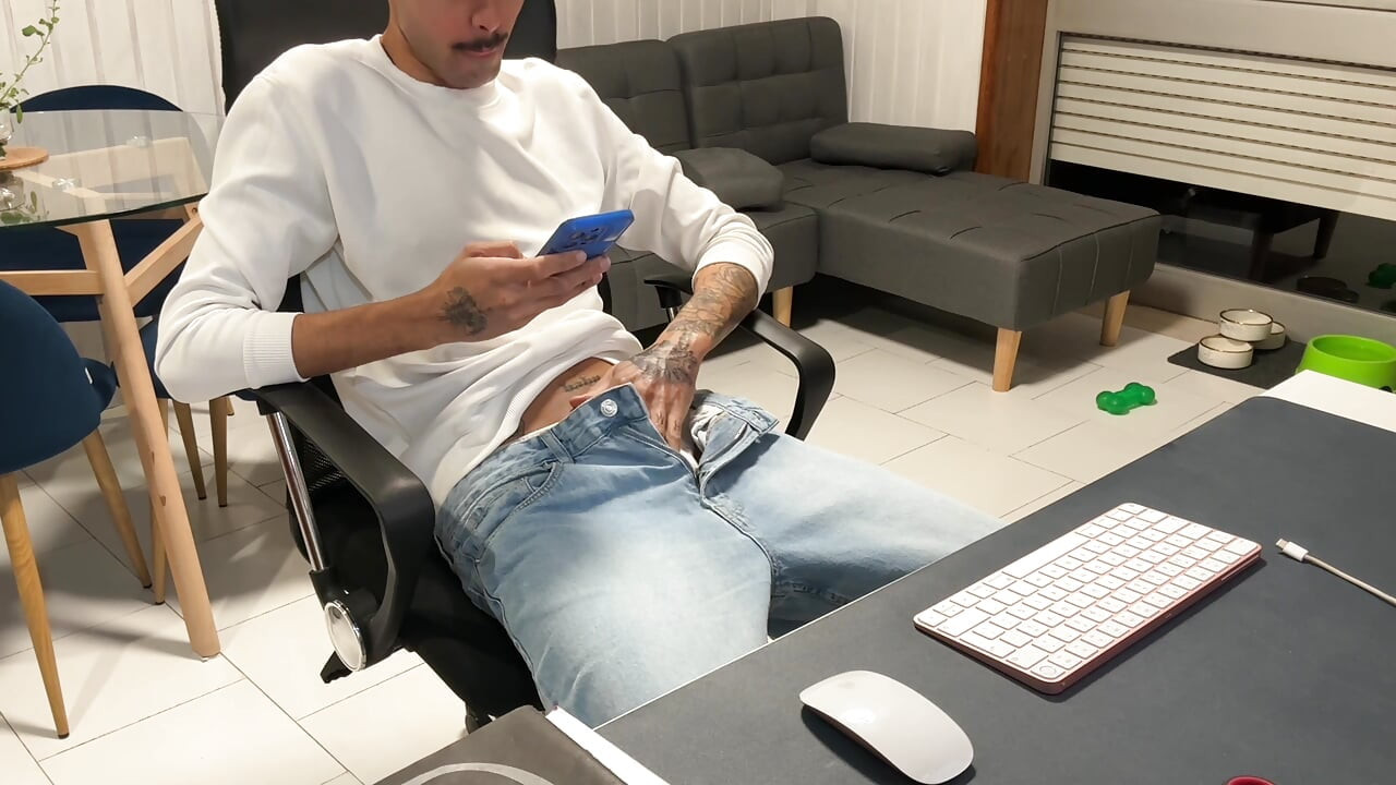 Skinny guy in jeans, pulls his dick out and jerks off on webcam.