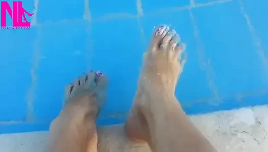 Barefoot Dangling in Swimming Pool Water